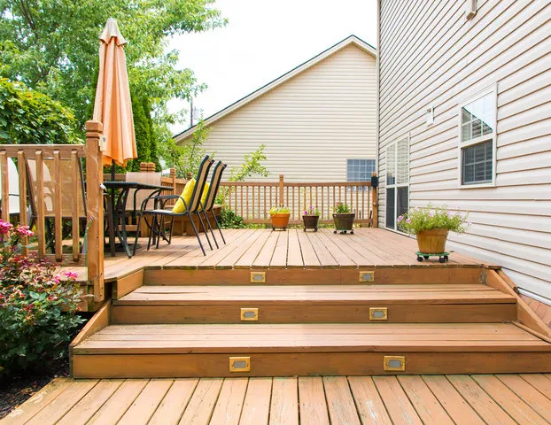 Wood deck builders in Sussex WI planning a custom backyard deck near Waukesha