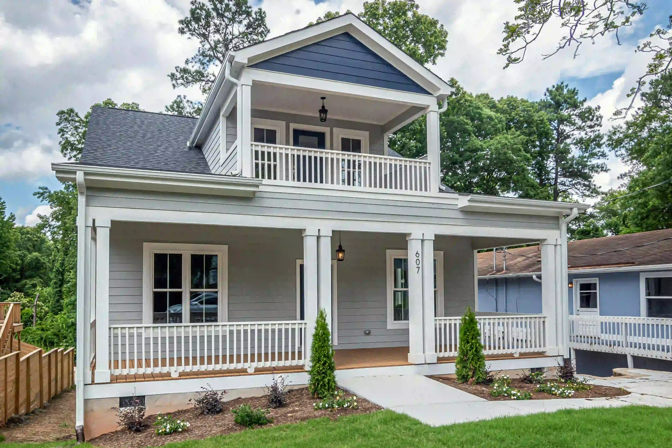 Beautiful screened-in three-season porch constructed for year-round comfort by Deck Builders Sussex WI.