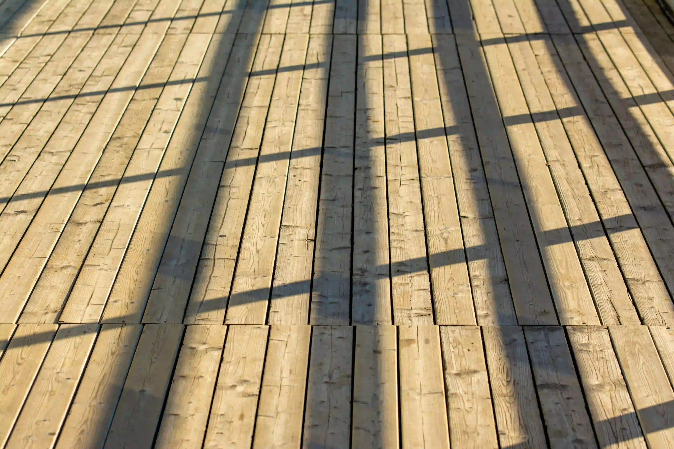Beautiful natural wood deck craftsmanship delivered by experienced Deck Builder Services Sussex WI.