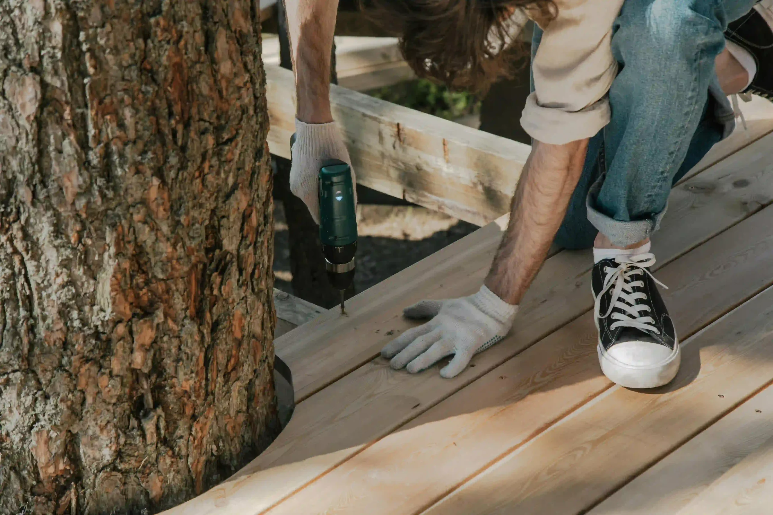 Contractors performing affordable and precise new deck installation by reliable Deck Builders Sussex WI.