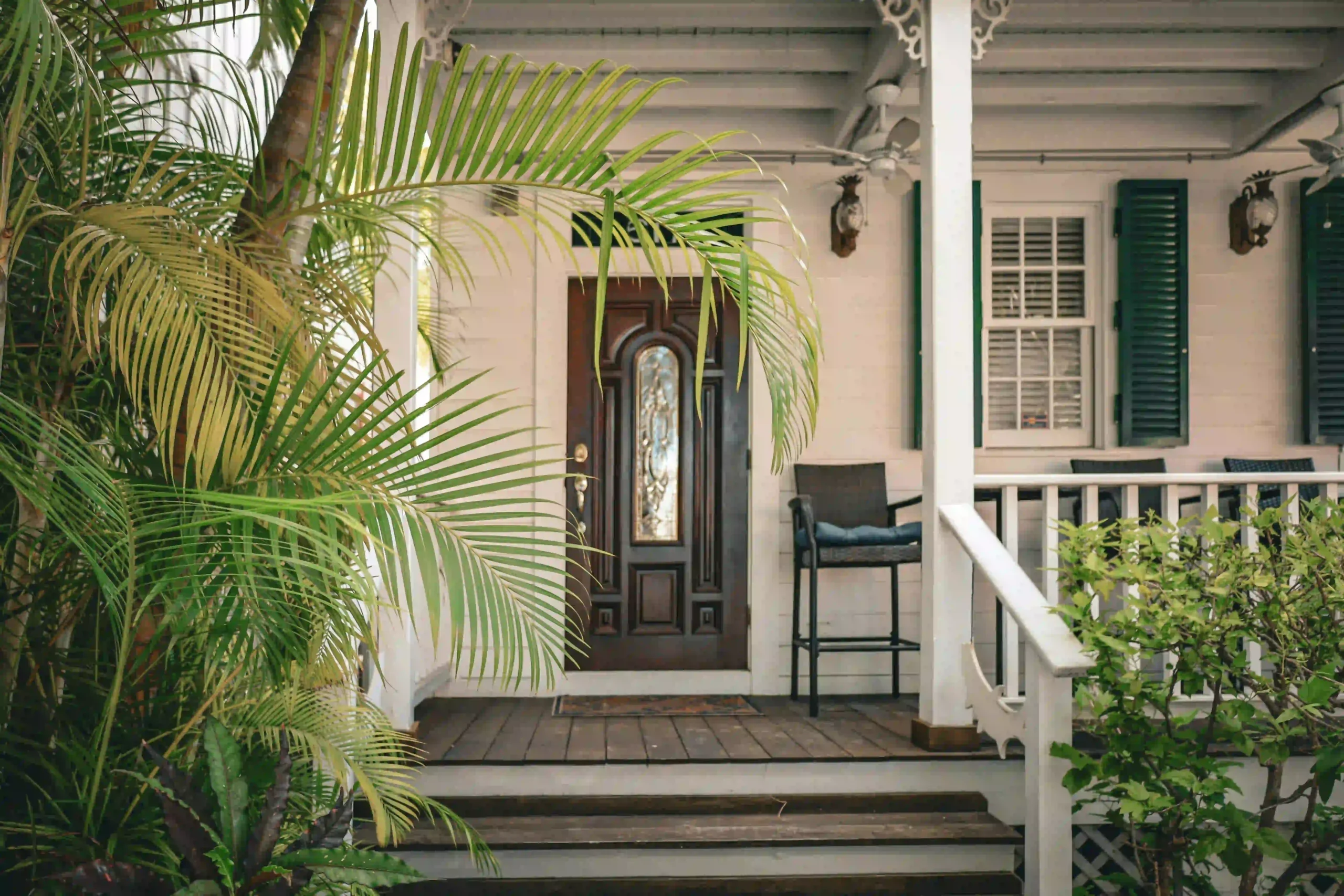 Durable and attractive covered porch constructed using reliable Deck Builder Services Sussex WI.