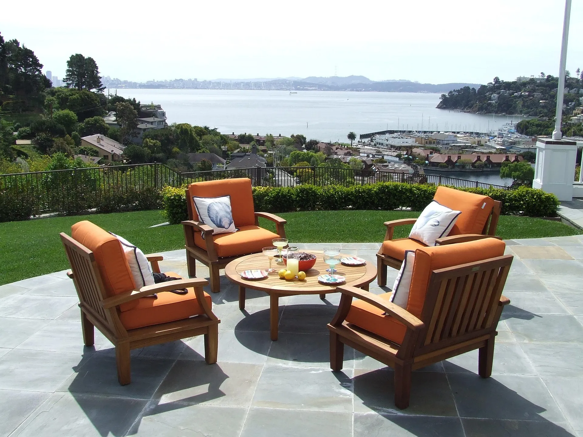 Professional deck builders in Sussex WI planning a durable backyard deck near Waukesha